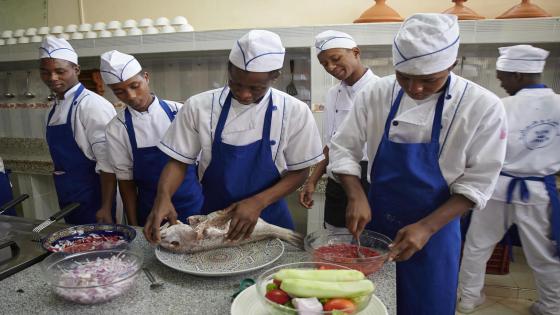 A group of immigrant youth from different Sub-Saharan countries in Africa, learn to cook at Shabiba Association. Oujda. Morocco.